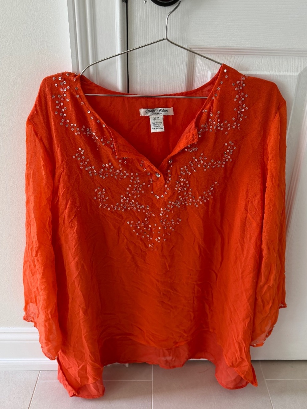 Orange embellished women’s blouse